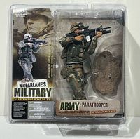Front view of sealed blister pack showing Army Paratrooper figure and branding