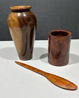 Bud vase, cylindrical holder, and letter opener grouped