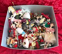 Top view of box showing all mixed Christmas figurines and ornaments