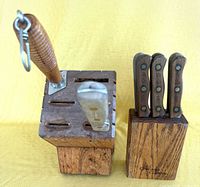 Both oak blocks with knives and honing steel visible