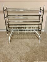 Chrome 5-tier shoe rack and white wire organizer together