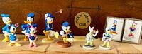 Group view of all figurines on shelf