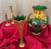Group shot of all four vases showing relative sizes and finishes