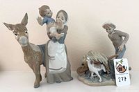 Both figurines side by side showing overall design and scale
