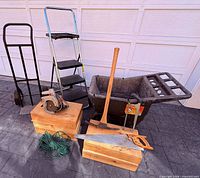 Group shot of all items including ladder, dolly, cart, crates, power and hand tools