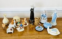 Group shot displaying all porcelain, jasperware, glass and figurine items