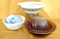 Group shot of all ten mixing bowls showing variety of patterns, sizes and colors