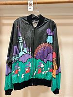 Front view of Disney World 1995 Marathon Tyvek bomber jacket hanging