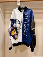 Front view of Tyvek Mickey Mouse marathon jacket on hanger
