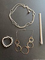 Group shot of all four sterling silver jewelry pieces