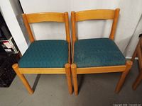 Front view of both wooden chairs