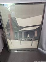 Front view of framed print showing image and title text