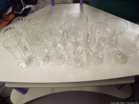 Group shot of all clear glass pieces on table