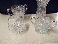 Group shot of four cut crystal pieces