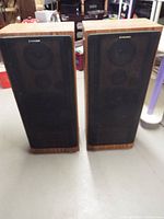 Front view of both Pioneer floor speakers with grills on