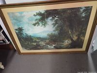 Full view of framed landscape print