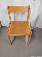 Front view of the wood side chair