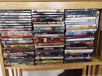 Full shelf view showing quantity of DVD cases