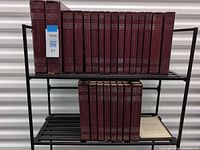 Full set of encyclopedia and dictionary volumes on shelving