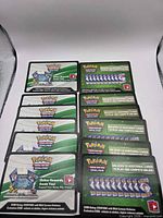 Stack of Pokémon TCG Online code cards, front design visible