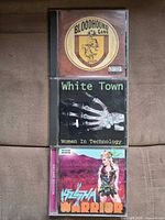 Front covers of the three CD jewel cases