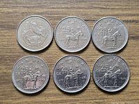 All seven coins overview