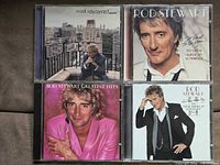 Front covers of all four Rod Stewart CDs displayed