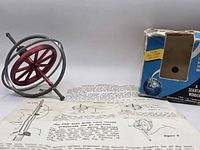 Gyroscope, instruction sheet, torn box