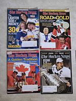 All four The Hockey News magazines laid out