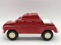 Left side view of red Tootsietoy armored car