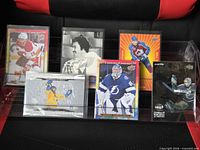 All six Upper Deck hockey cards displayed in protective sleeves