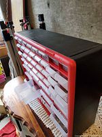 Front and side view of plastic drawer organizer