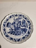 Front view of De Zadelmaker Delft plate