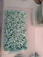 Pale mint Smalti glass strips in bin