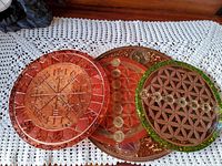 Three resin crystal grid discs stacked showing overall lot