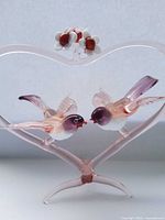 Front view of Murano glass bird heart figurine