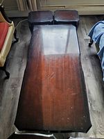 Top view of coffee table with two side tables nested beneath