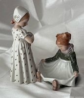 Both figurines front view