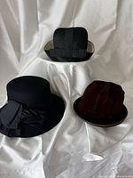 Group shot of three hats showing overall styles and colours