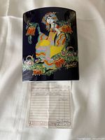 Front view showing multicolour gilt design and artist signature