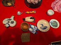 Group shot of all ten collectible items on red background