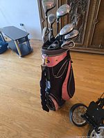 Golf bag loaded with clubs
