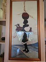 Full view of framed batik artwork