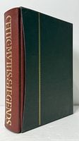 Spine view of book in slipcase showing gilt title and green cloth