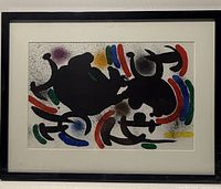 Front view of framed Joan Miró lithograph showing full artwork and frame