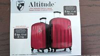 Retail box showing Heys Altitude 2-piece lightweight spinner luggage details