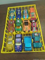 Top view of tray containing all twelve cars