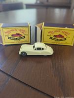 Cream Matchbox Lesney Jaguar XK120 with original yellow/blue No.32 box halves