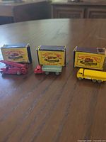 Group shot: three vehicles with their boxes