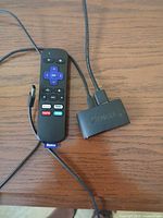 Remote and adapter side by side showing overall condition